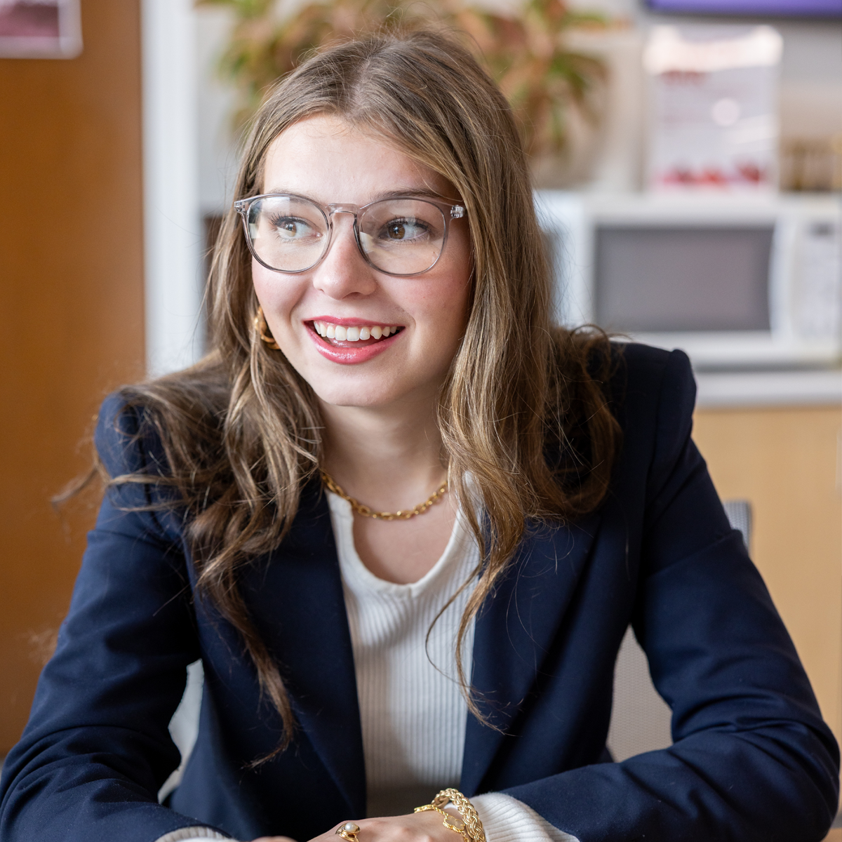 Eccles student in business attire.